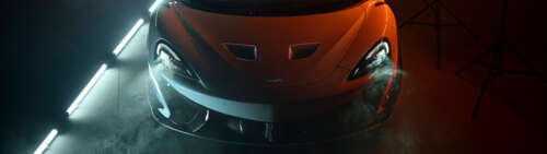 A high-performance McLaren 620R supercar in a bright orange finish, showcasing its... wallpaper
