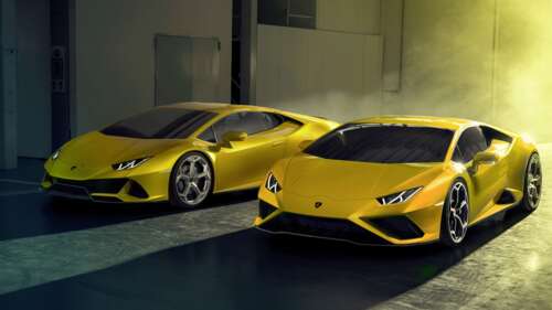 A high-performance yellow Lamborghini Huracan Evo supercar featuring sleek aerodynamic... 8K high definition wallpaper