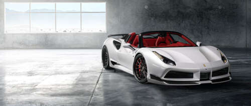 A pristine white Ferrari 488 supercar showcasing its aerodynamic design and elegant... UWUHD
