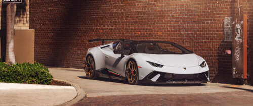 A high-performance white Lamborghini Huracan Performante supercar.