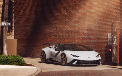 A high-performance white Lamborghini Huracan Performante supercar. 7680x4800 ps4 wallpaper