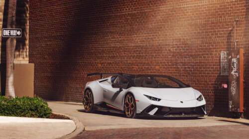 A high-performance white Lamborghini Huracan Performante supercar. 8K free wallpaper for computer