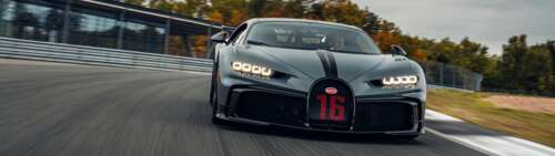 A close-up view of a Bugatti Chiron Pur Sport, featuring its sleek aerodynamic body... Dual UHD wallpaper download