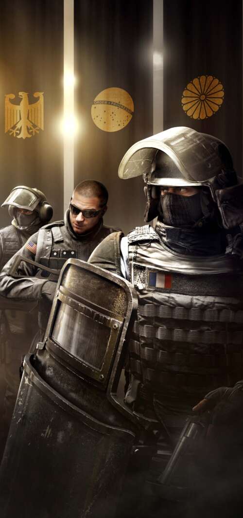 A heavily armed tactical operator in combat gear and military equipment from the... wallpaper download