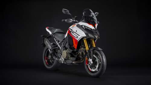 A detailed close-up of the 2024 Ducati Multistrada V4 RS adventure motorcycle in...