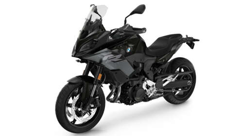 A sleek black 2025 BMW F 900 XR adventure motorcycle isolated on a plain white background. wallpaper