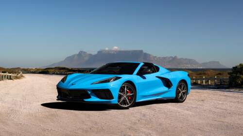 A detailed, high-resolution close-up of the 2025 Chevrolet Corvette Stingray featuring... free hd wallpapers