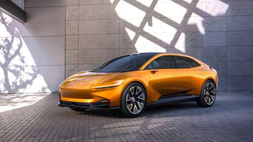 A sleek and futuristic electric concept car with aerodynamic curves and advanced... wallpaper photo gallery download