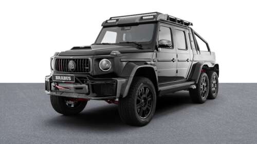 A high-contrast black and white photograph of the 2025 Mercedes-AMG G 63, showcasing... free wallpaper