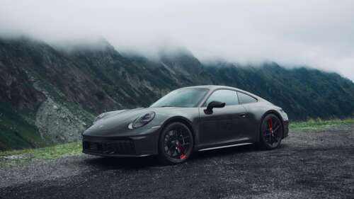 A high-resolution 5K close-up of the 2025 Porsche 911 Carrera 4 GTS showcasing its... wallpaper download