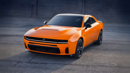 A sleek and powerful 2026 Dodge Charger Daytona Scat Pack featuring modern muscle... free wallpaper