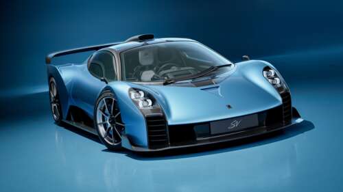 A sleek 2026 Le Mans Hypercar with advanced aerodynamic features against a solid... wallpaper images