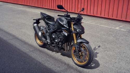 A high-performance 2025 streetfighter motorcycle with aggressive styling and futuristic... free background images