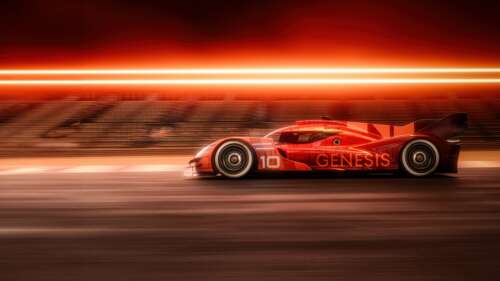 A sleek and aerodynamic Genesis GMR-001 hypercar in a striking orange color scheme,... free wallpaper for computer