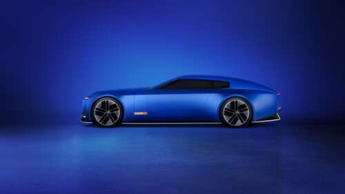 A sleek, monochromatic blue Jaguar Type 00 concept car in a deep French Ultramarine... wallpaper