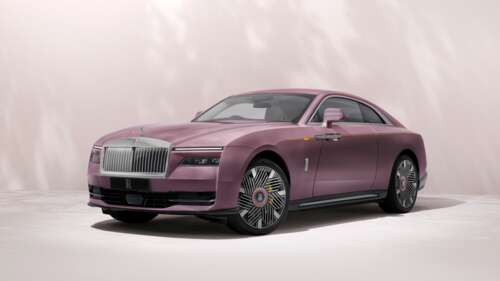 A high-resolution, detailed close-up of the sleek and modern Rolls-Royce Spectre... free wallpaper