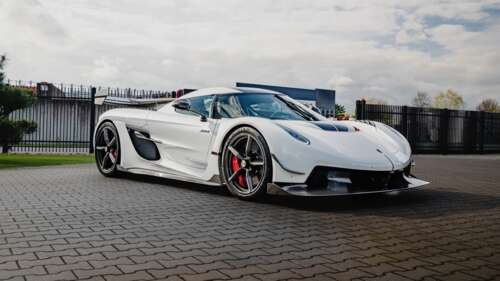 A high-resolution, detailed shot of a white Koenigsegg Jesko hypercar. wallpaper photo gallery download
