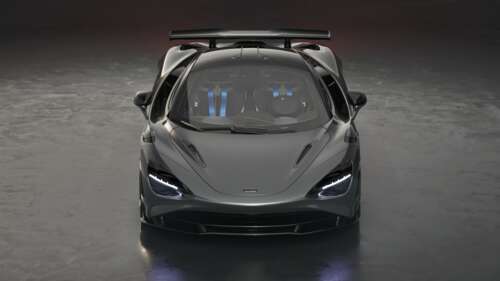 A high-resolution close-up of a McLaren 750S Le Mans supercar, showcasing its aerodynamic... wallpaper