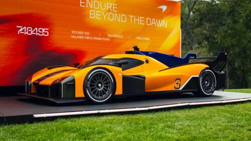 A detailed 8K rendering of the McLaren Project Endurance Le Mans Hypercar racing... wallpaper
