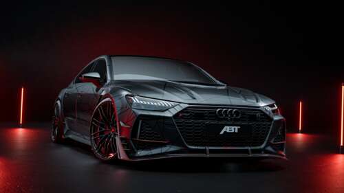 An Audi RS7-R with neon lighting accents in a dark, cinematic setting. wallpaper for pc download