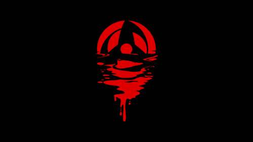 Close-up of Obito Uchiha's Mangekyo Sharingan eye from the Naruto anime series on... wallpaper