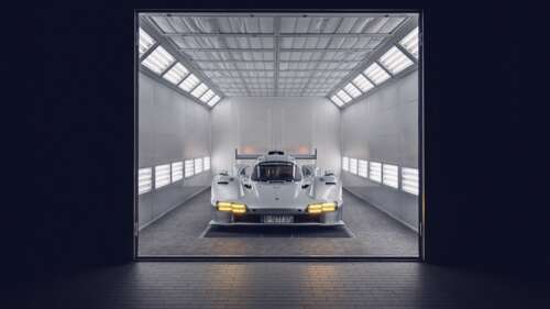 A sleek and aerodynamic Porsche 963 prototype hypercar, showcasing its cutting-edge... free wallpaper