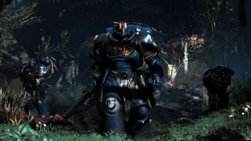A heavily armored Ultramarine Space Marine from Warhammer 40,000: Space Marine 2... free hd wallpapers