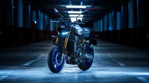 A detailed view of the 2024 Yamaha MT-09 naked motorcycle, emphasizing its aggressive... wallpaper download