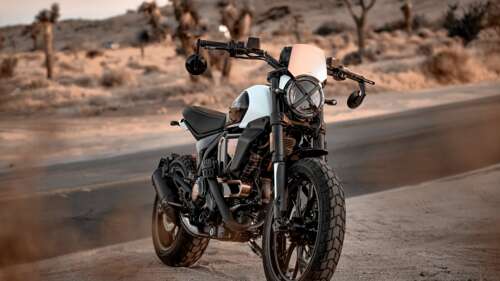 A high-resolution, detailed close-up of the 2025 Ducati Scrambler Anniversary Edition... wallpaper