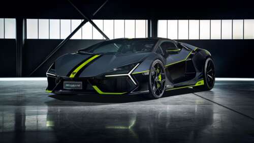 A high-detail, dark aesthetic shot featuring a Ducati motorcycle and a Lamborghini... free hd wallpapers