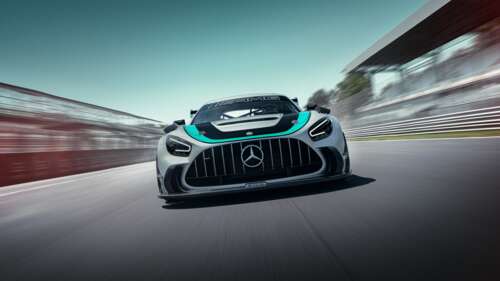 A high-performance Mercedes-AMG GT2 Edition W16 racing on a professional circuit. wallpaper download