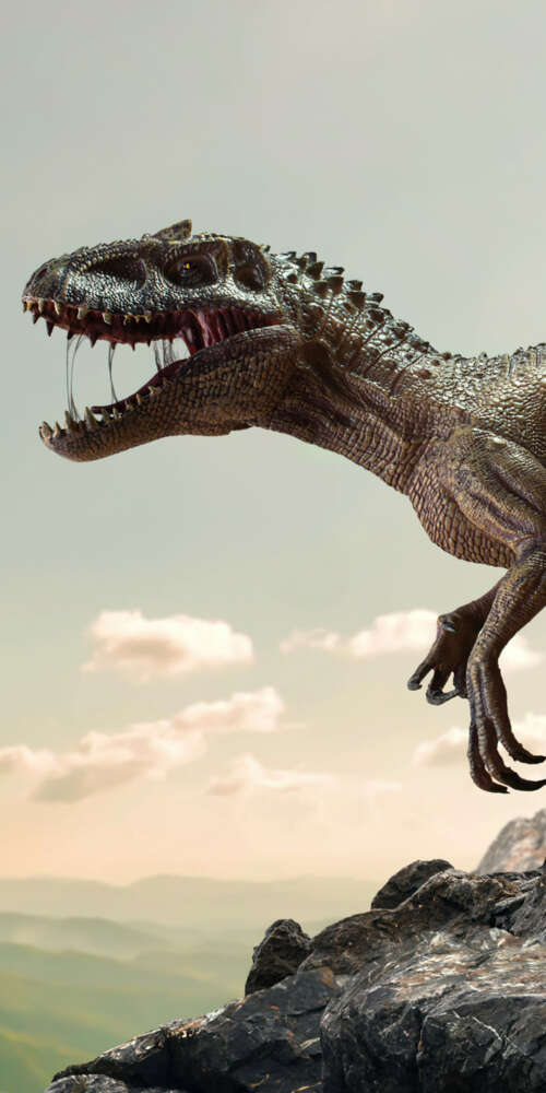 A prehistoric dinosaur navigating through a canyon of large, ancient rocks and stone... Doogee Fire 3 Max lock screen wallpaper