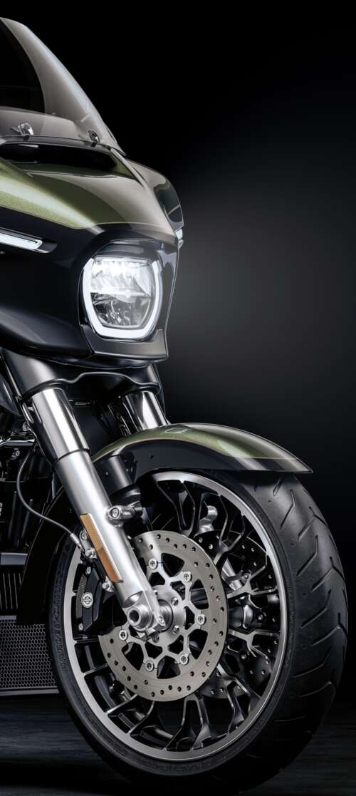 A high-detail view of a 2026 Harley-Davidson Street Glide cruiser motorcycle set... Motorola Moto G Stylus (2026) free background
