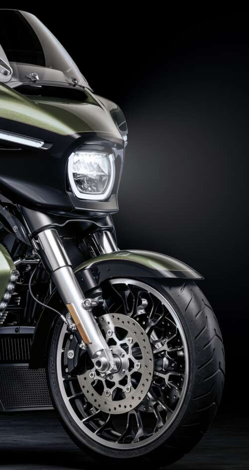 A high-detail view of a 2026 Harley-Davidson Street Glide cruiser motorcycle set... Sharp Aquos C10 lock screen wallpaper