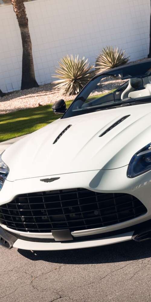 A high-resolution, detailed view of a luxury Aston Martin DB12 S Volante convertible... Doogee Fire 3 Ultra cell phone backgrounds free