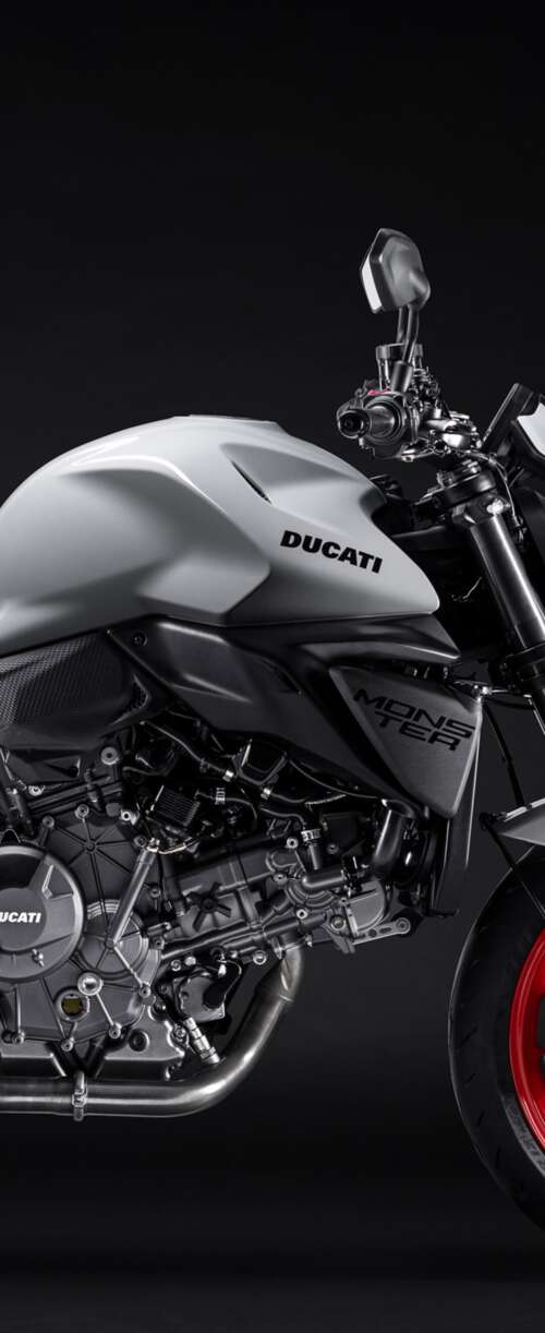 A high-detail shot of the 2026 Ducati Monster V2 sports motorcycle featuring a dark,... Samsung Galaxy Z Flip7 FE free hd wallpapers