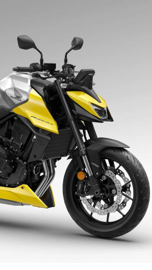 A detailed close-up of the futuristic 2026 Honda CB750 Hornet motorcycle showing... Apple iPhone SE 2022 wallpapers for android