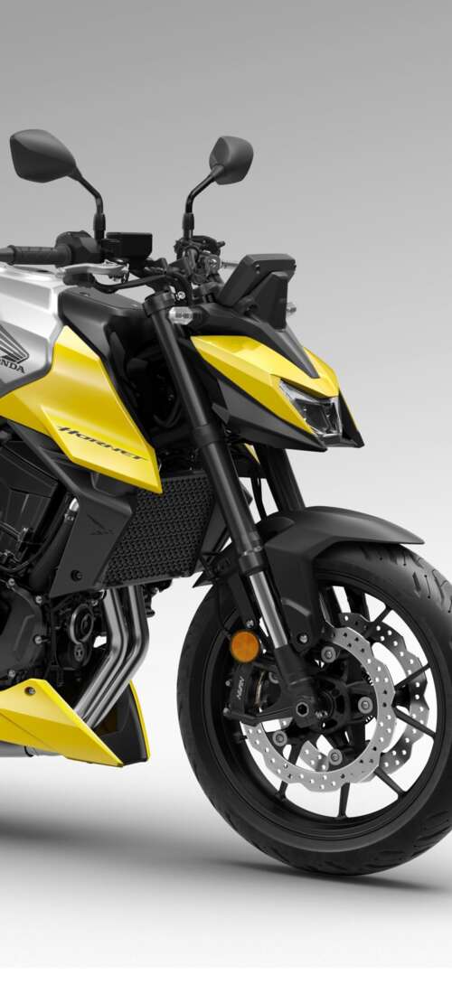 A detailed close-up of the futuristic 2026 Honda CB750 Hornet motorcycle showing... Huawei Pura 80 wallpaper