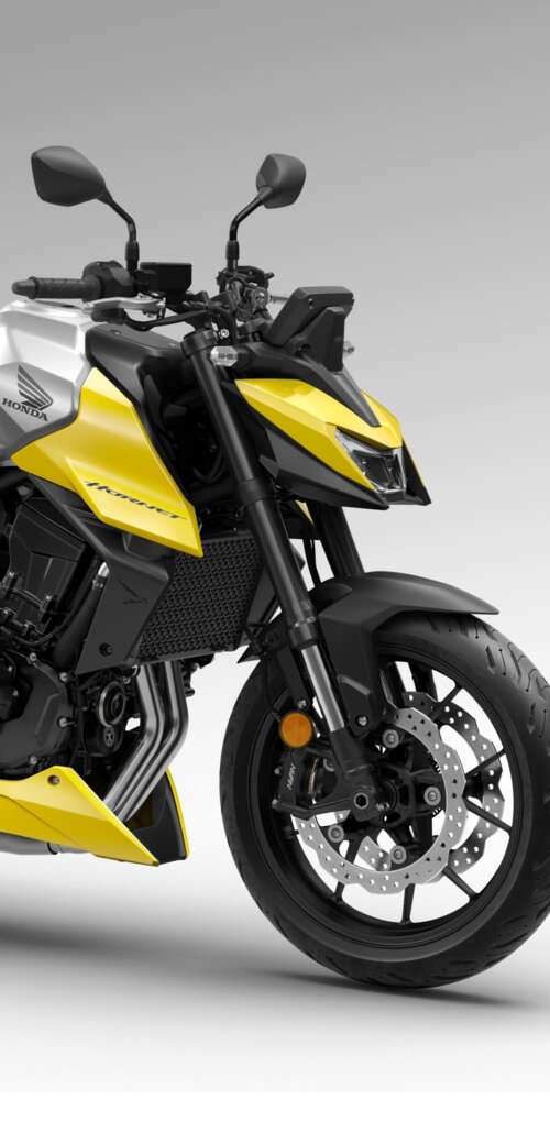 A detailed close-up of the futuristic 2026 Honda CB750 Hornet motorcycle showing... Huawei Mate 30 Pro hd background