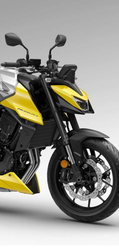 A detailed close-up of the futuristic 2026 Honda CB750 Hornet motorcycle showing... Oppo A6k 4G free background images