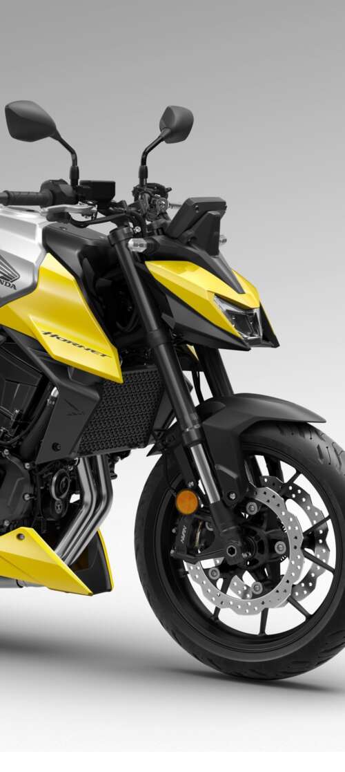 A detailed close-up of the futuristic 2026 Honda CB750 Hornet motorcycle showing... Motorola Moto X70 Air wallpaper