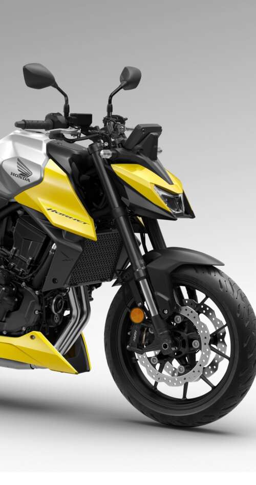 A detailed close-up of the futuristic 2026 Honda CB750 Hornet motorcycle showing... Sharp Aquos C10 hd background