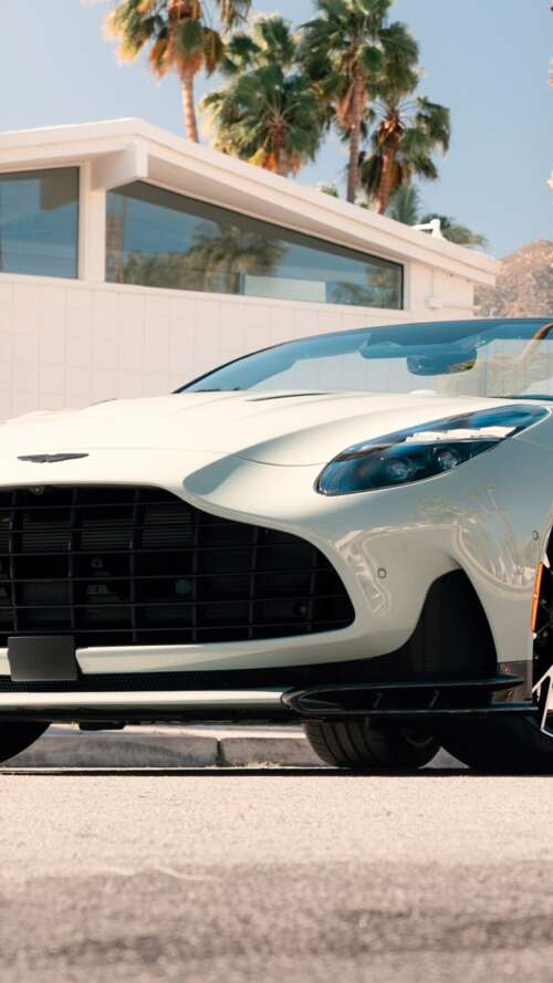 A detailed high-resolution view of the 2026 Aston Martin DB12 S Volante luxury convertible... Apple iPhone SE 2022 cell phone backgrounds free