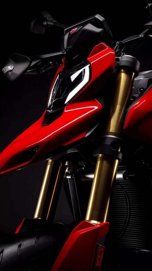 A high-detail, cinematic shot of a 2026 Ducati Hypermotard V2 motorcycle positioned... Apple iPhone SE 2022 hd background