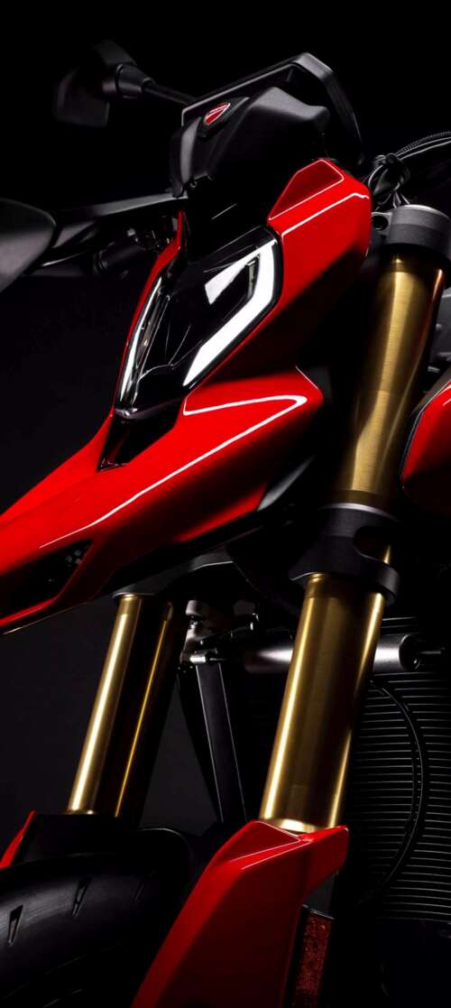 A high-detail, cinematic shot of a 2026 Ducati Hypermotard V2 motorcycle positioned... Motorola Edge (2025) cell phone backgrounds free