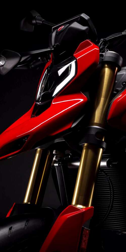 A high-detail, cinematic shot of a 2026 Ducati Hypermotard V2 motorcycle positioned... Ulefone Armor X32 Pro 4G free wallpaper