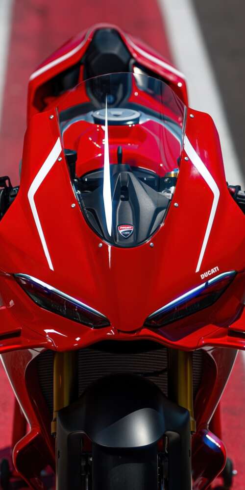 A sleek, red 2026 Ducati Panigale V4 R sports motorcycle in high detail. Ulefone Rugking 2 Pro