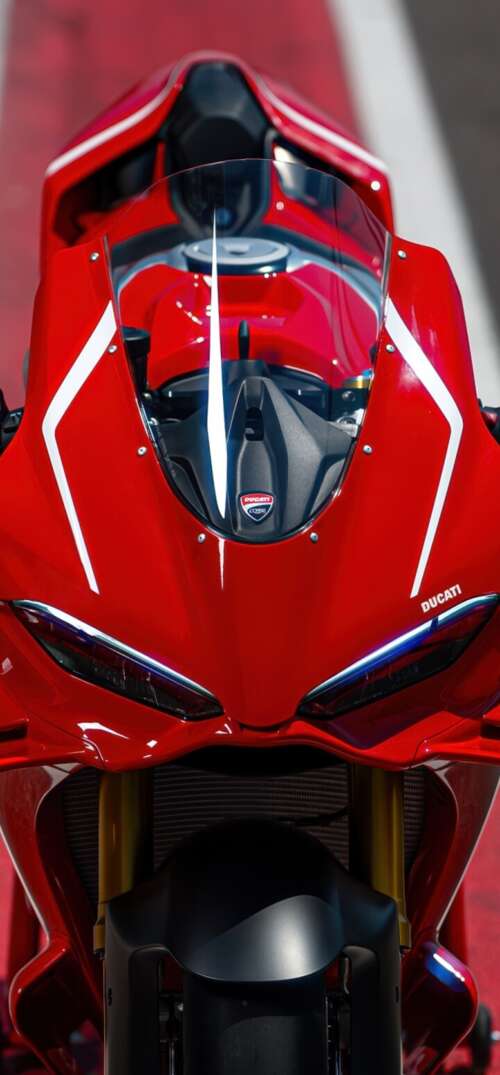 A sleek, red 2026 Ducati Panigale V4 R sports motorcycle in high detail. UmiDigi Umidigi X free wallpaper