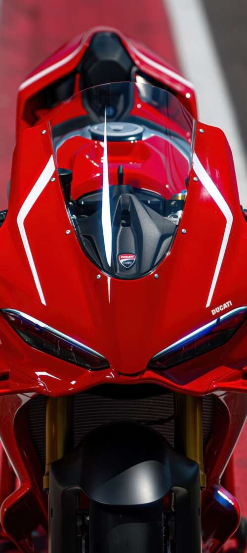 A sleek, red 2026 Ducati Panigale V4 R sports motorcycle in high detail. Motorola Edge (2025) wallpapers for android