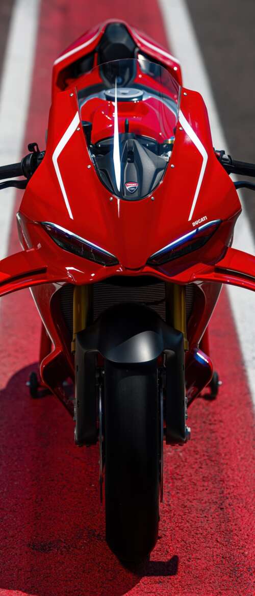 A high-detail view of a red 2026 Ducati Panigale V4 R sports motorcycle featuring... nubia Flip 3 wallpaper